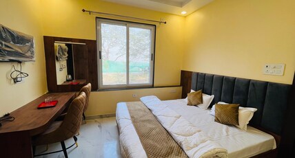 SANGAM DARSHAN Room Type - Deluxe Room with SANGAM View