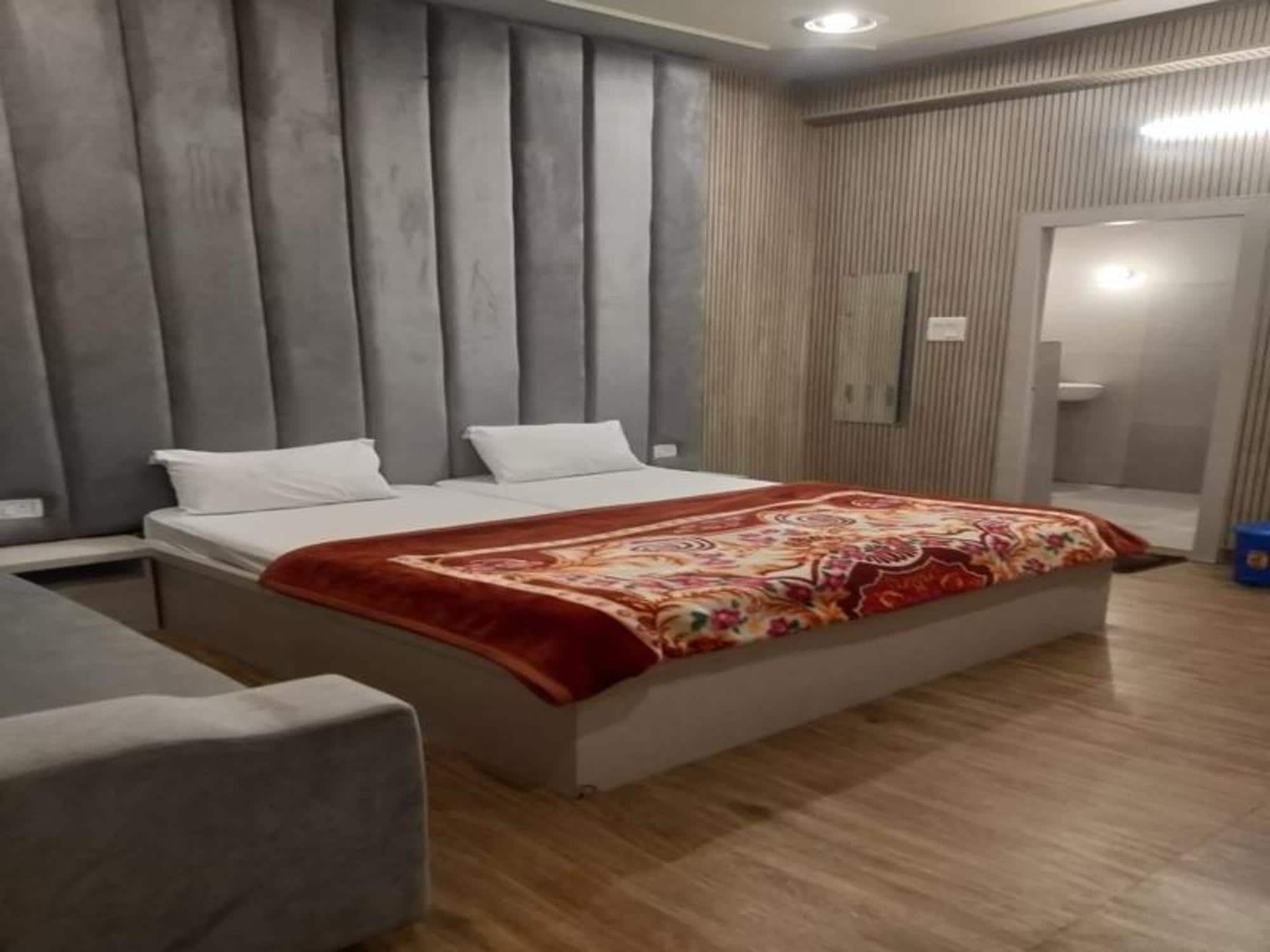 Hotel Satyam Dham By WB Inn - Tap to explore photos