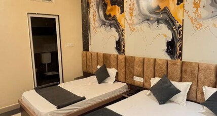 Hotel Kaka Inn Room Type - AC Deluxe Three Bed Room
