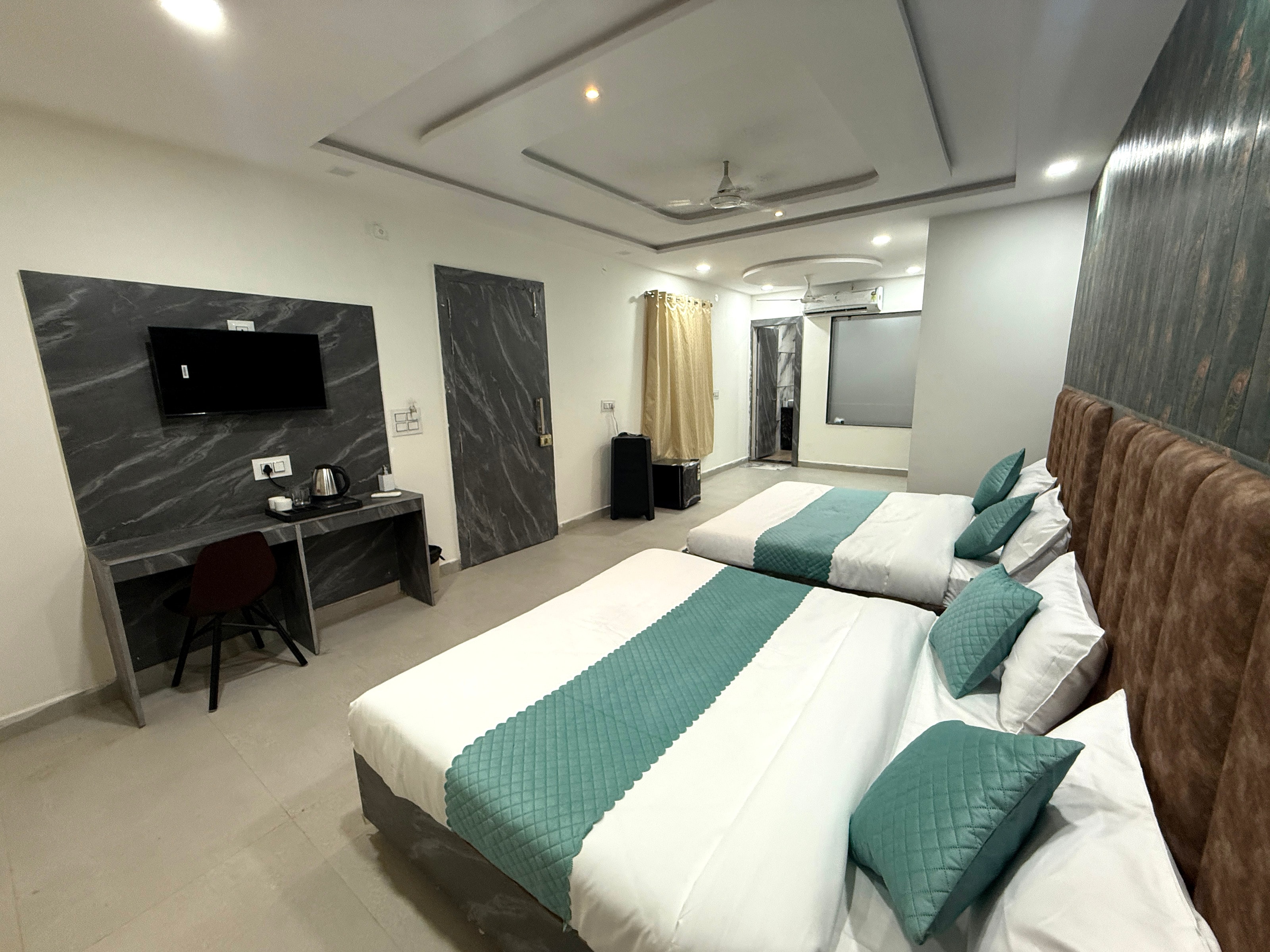 The Grand Luxury Stay Hotel - Tap to explore photos