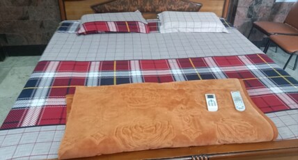 Nirmal Cottage Room Type - Deluxe Room with Fan