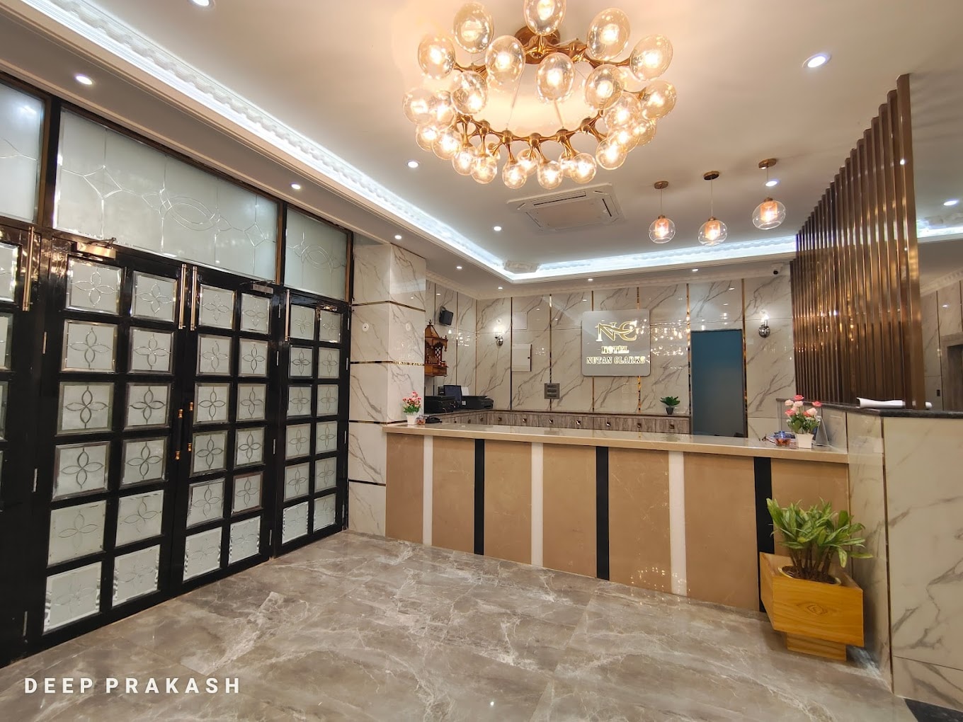 Hotel Nutan Clarks - Tap to explore photos
