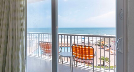 Best Western Plus Daytona Inn Seabreeze Oceanfront Room Type - 1 King Bed, Non-Smoking, Ocean Front, Balcony, Mini Fridge, Full Breakfast Best Western Plus Daytona Inn Seabreeze Oceanfront Room Type - 1 King Bed, Non-Smoking, Ocean Front, Balcony, Mini Fridge, Full Breakfast