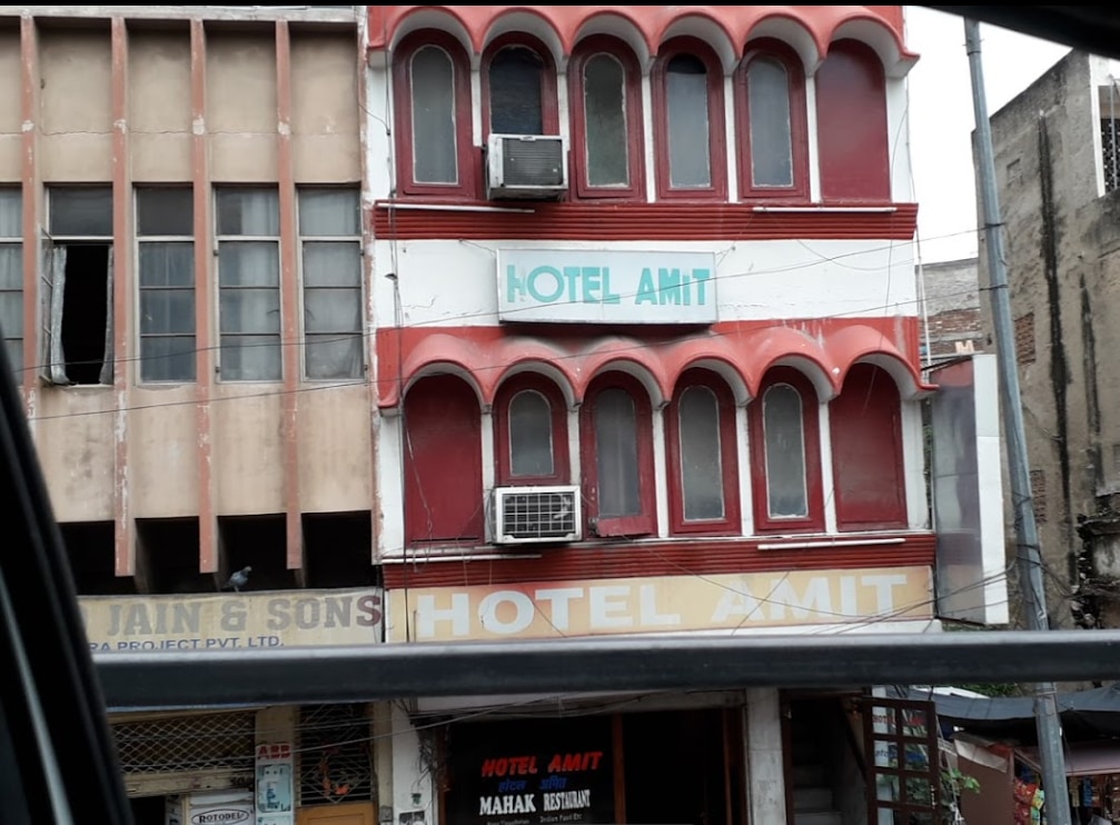 Amit Hotel - Tap to explore photos