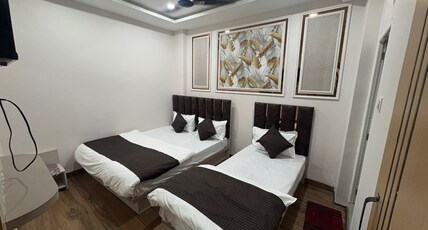 Hotel Mangal Bhawan Room Type - Deluxe Three Bed Room
