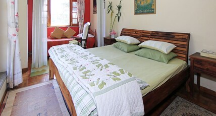 Mahavan | Rooms in a Homestay Room Type - Red Room