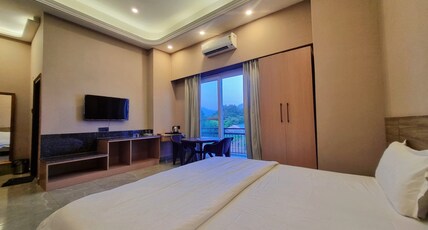 Anandam Homestay Room Type - Room with King Size Bed, Smart TV and private Balcony