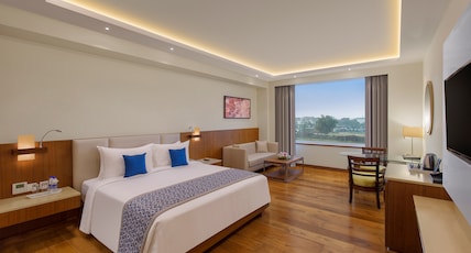 Viraj Sarovar Portico Room Type - Junior Suite - 1 Double Bed 49SQM WiFi Living Area Bathtub and Shower Viraj Sarovar Portico Room Type - Junior Suite - 1 Double Bed 49SQM WiFi Living Area Bathtub and Shower