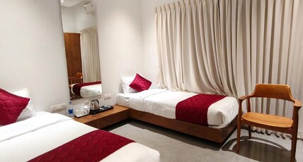 Indudharam Tourist Home   Vaikom Temple Room Type - Standard Twin Room