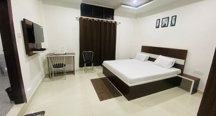 Sneha Bhawan Kaziranga Room Type - Deluxe King Bedded Room