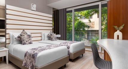 The Atara Near Golf Course Road Room Type - Deluxe Twin-Bed Room