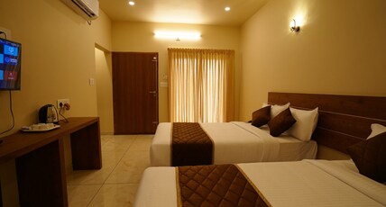 KOTTACKAL NATURE INN Room Type - Delxue family AC room