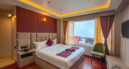 NORGYUNMA HOTEL AND RESTAURANT Room Type - SUPER DELUXE