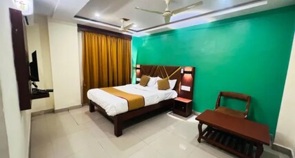 FabHotel Sri Sai Palace Room Type - Deluxe Room FabHotel Sri Sai Palace Room Type - Deluxe Room