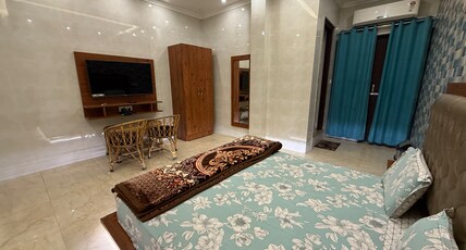 Hotel Gangotri Plaza @Laxman Jhula Room Type - Deluxe Room