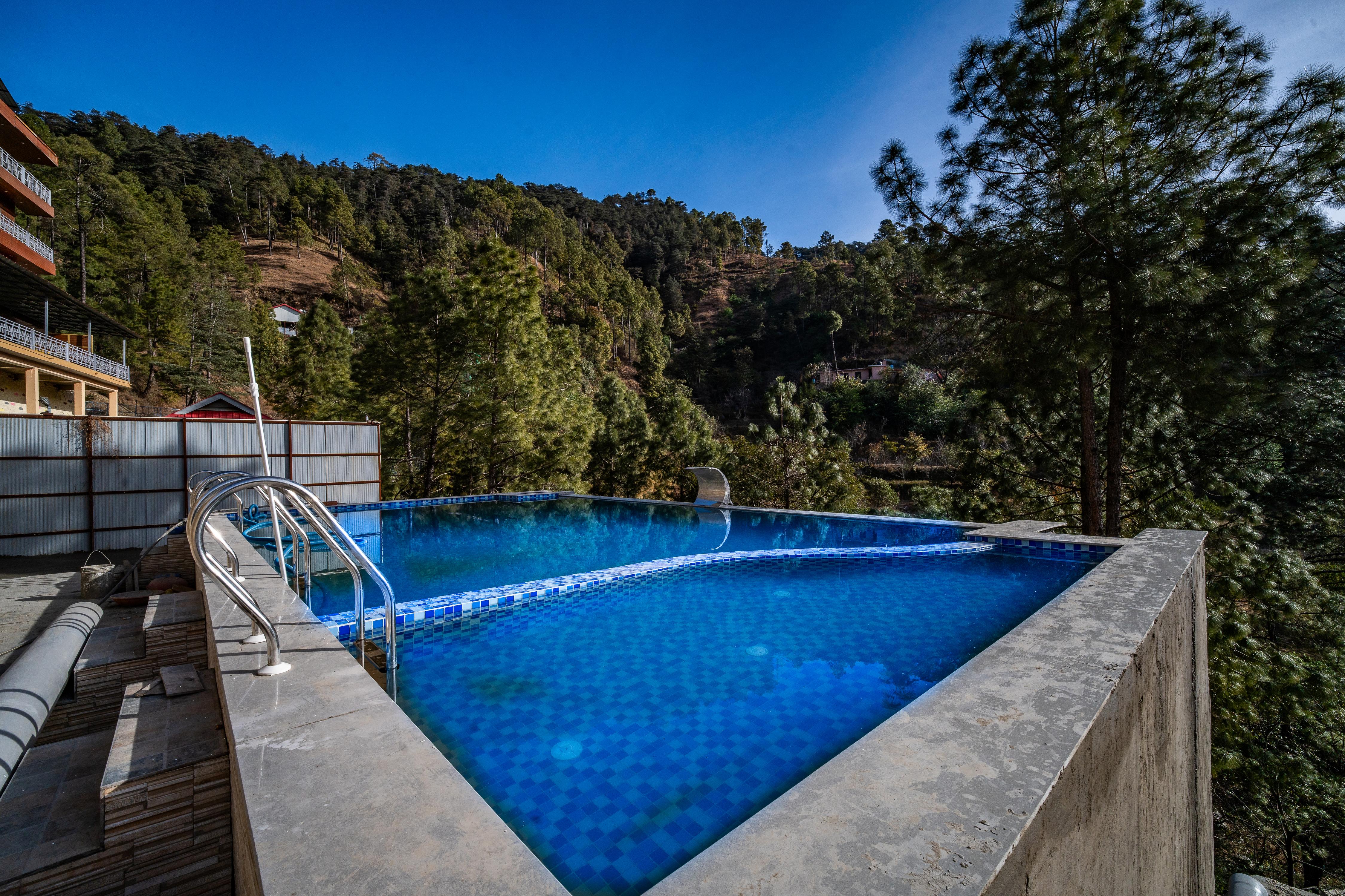 Vedikant Pine Tree Resort - Tap to explore photos