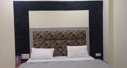 Hotel Ashirwad Inn Room Type - Deluxe Room with City View Bed