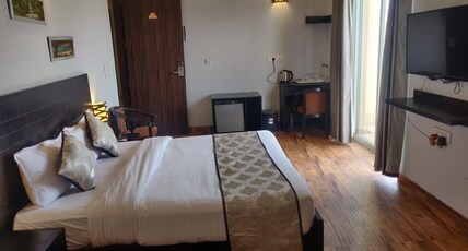 Hotel dhruva inn shree dham Room Type - deluxe room