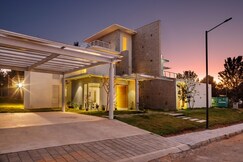 Golf View 4BHK by StayJade With Garden and Projector