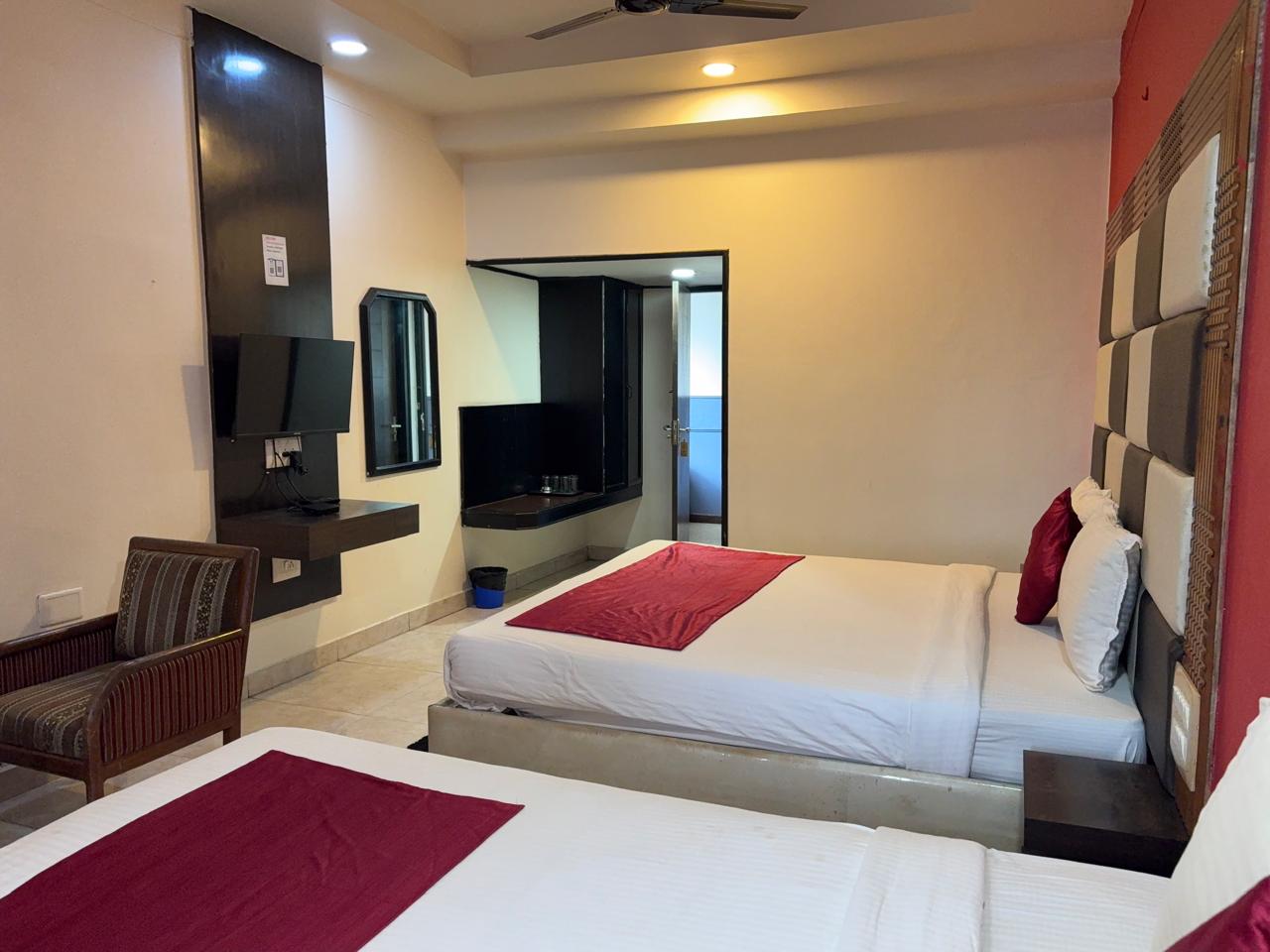 Hotel New Rajadarshan - Tap to explore photos