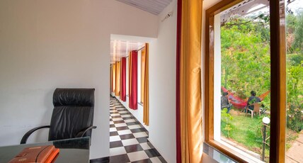 Olives pleasant stay Room Type - Deluxe Room