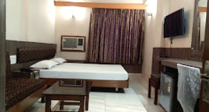 Hotel Divya Palace Room Type - Deluxe Room AC