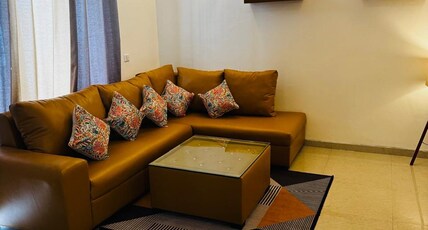 Zoomstay | Entire 3BHK Apartments with Pool Room Type - 3BHK apartment with pool access Zoomstay | Entire 3BHK Apartments with Pool Room Type - 3BHK apartment with pool access