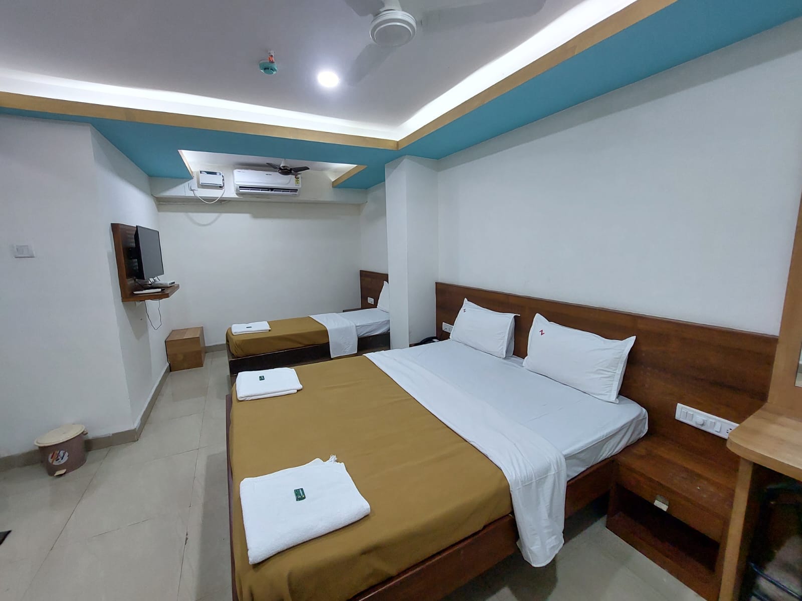 Hotel Z Square, Bicholim - Tap to explore photos