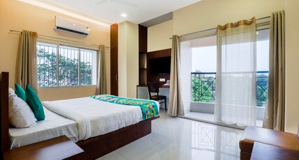 Treebo Urban Oasis Inn, Sixmile Room Type - Deluxe Room