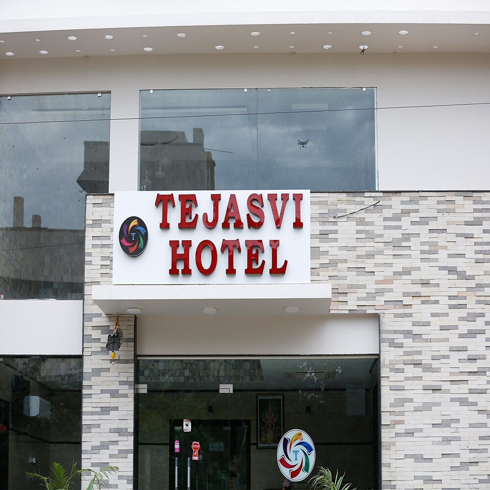 Tejaswi Hotel - Tap to explore photos