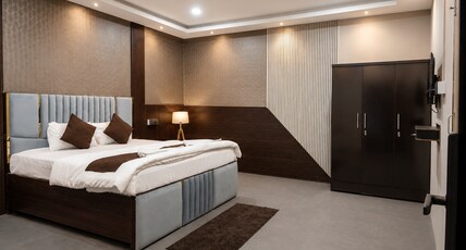 AXOM HOMESTAY & VILLAS Room Type - Deluxe Room with Air Conditioning AXOM HOMESTAY & VILLAS Room Type - Deluxe Room with Air Conditioning