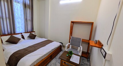 Accomoon hillside homes Room Type - Double bed deluxe room with mountain view