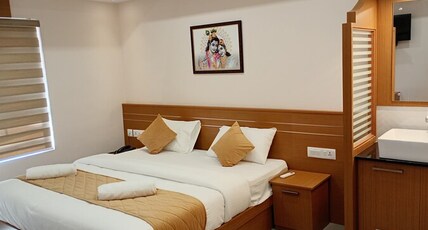 CHOTTANIKKARA AMMA RESIDENCY Room Type - Deluxe Room