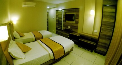 HOTEL AHMEDABAD INN Room Type - Deluxe Room