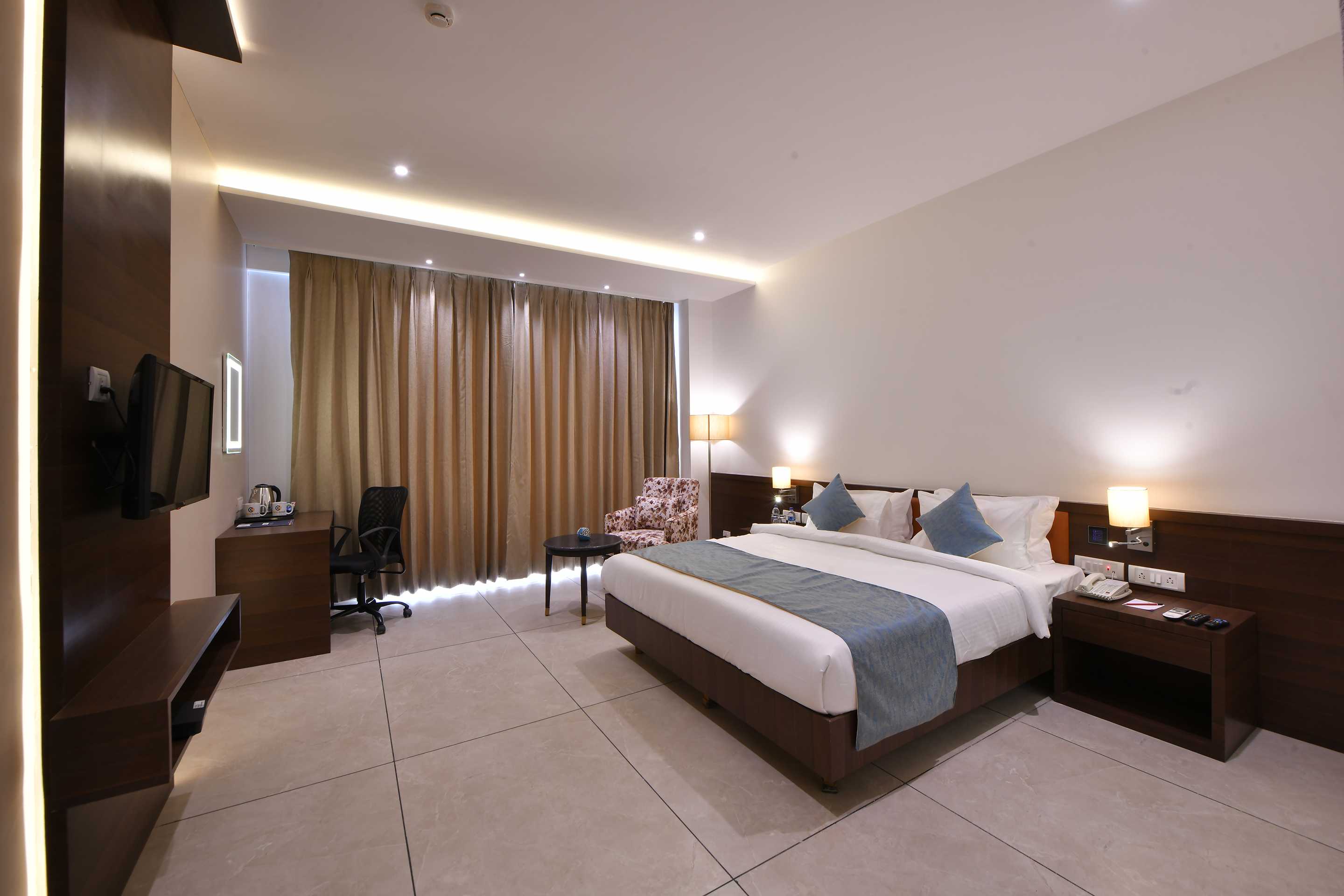 Clubhouse Hotel Morbi by CheckIn - Tap to explore photos