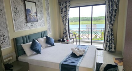 Parijat Resort Room Type - Premium Room with Private Balcony (Non Ac) First Floor Parijat Resort Room Type - Premium Room with Private Balcony (Non Ac) First Floor