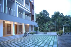 PopTavern Nakshatra Apartments Thiruvananthapuram