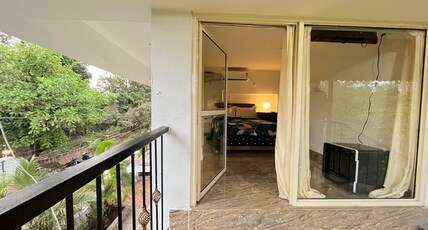 Cozy Homes at Vagator by GOAROUND Room Type - Cozy Homes Glass Room with Balcony 7