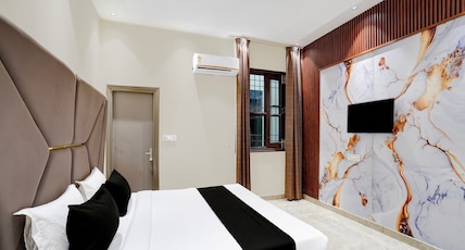 Collection O City Centre Sapror Formerly Hotel Greens Room Type - Deluxe