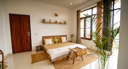 The Jungalow by AVVAs Stays Room Type - King Room with Sunset View