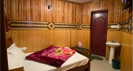 Padayappaa Residency Room Type - Wooden theme Room