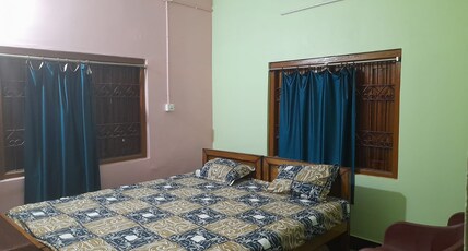 Sadhu Inn Room Type - Two bedded non AC room with shared bathroom