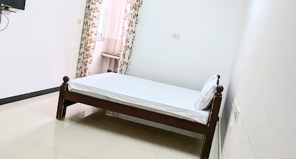 PALLIYARAI GARDENS LODGE Room Type - AC Double Room