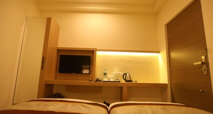 NESTLAY ROOMS VANAGARAM Room Type - Deluxe Double  Room With Kitchen (1BK)