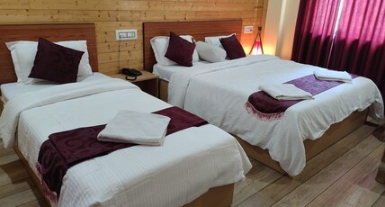 SUMARU JUNGLE RESORT Room Type - AC DELUXE TRIPLE BED ROOM