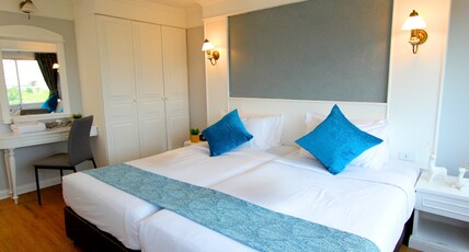 Coco Beach Hotel Jomtien Pattaya Room Type - Family Suite 2 Bedroom City View - King and 2 Single Bed Coco Beach Hotel Jomtien Pattaya Room Type - Family Suite 2 Bedroom City View - King and 2 Single Bed