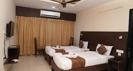 Green park Elite Room Type - Corporate Room ( Twin bed)