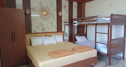 AZHAGU BEACH RESORT Room Type - Family Room Sea View AC(Ground FLR) AZHAGU BEACH RESORT Room Type - Family Room Sea View AC(Ground FLR)