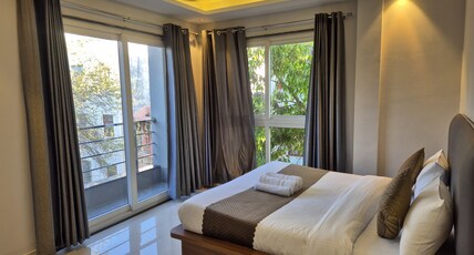 Hotel Aura luxury golf course road Room Type - Deluxe 1BHK
