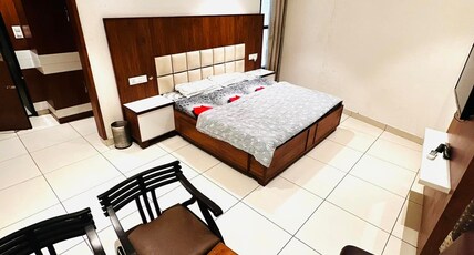 Deepak hotel  Room Type - Deluxe Rooms